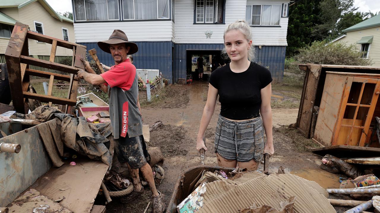 Andrew Rose and daughter Gemma, 18, escaped the floods through their roof, with the rest of the family. Picture: Toby Zerna