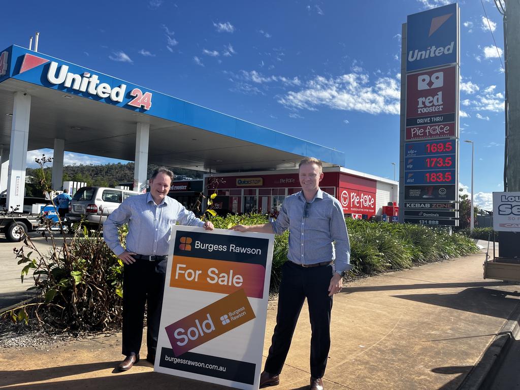Burgess Rawson commercial agents Michael Hooper and Neville Smith have celebrated the auction sale of United Petroleum, Red Rooster & Dominos for $7.8m. Picture: Supplied.