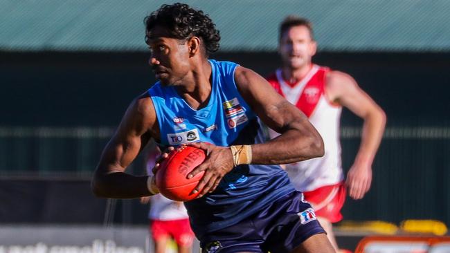 Rovers' Tosh Kunoth sets his sights on the goals on the way to booting six against Federal in a minor round game. Picture: Charlie Rowson