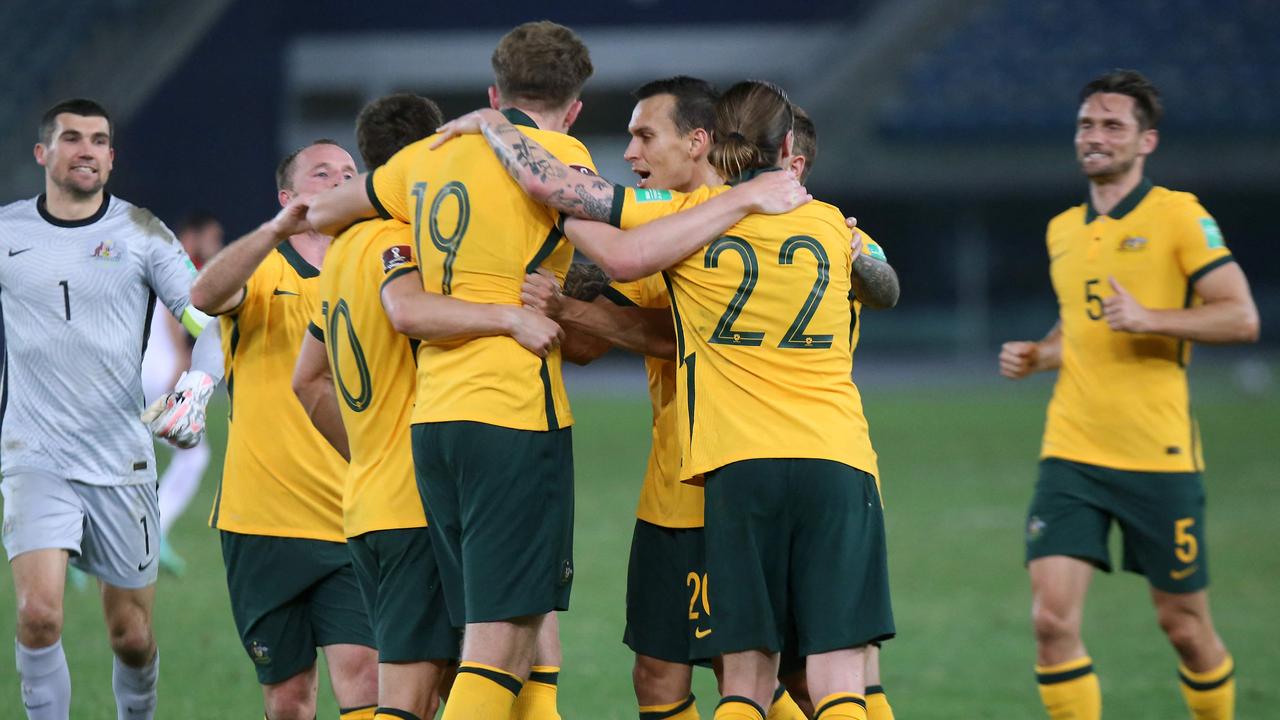 Australia's Harry Souttar (19) celebrates his goal with his teammates during the 2022 FIFA World Cup qualification group B football match between Australia and Jordan at the Kuwait Sports Club in Kuwait City on June 15, 2021. (Photo by Yasser Al-Zayyat / AFP)