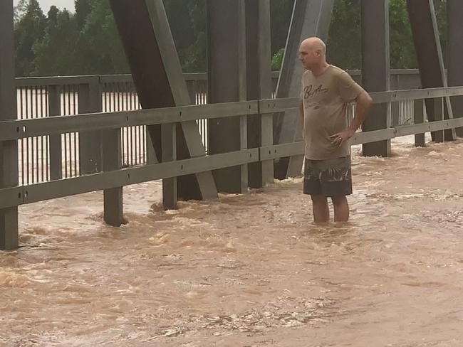 A man looks over the side of the Ballina Street Bridge on February 28, 2022. Picture: Cath Piltz