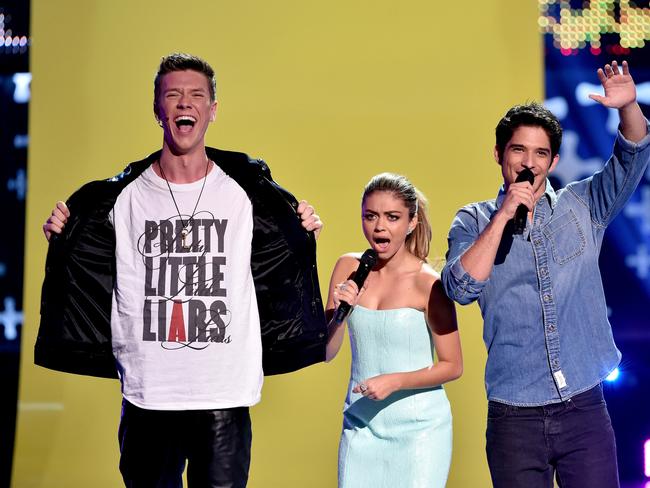 Actor Collins Key, Hosts Tyler Posey and Sarah Hyland onstage during FOX’s 2014 Teen Choice Awards. Picture: Getty