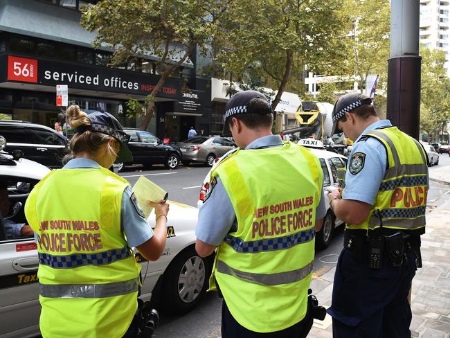 North Sydney police booking taxis in Berry St.