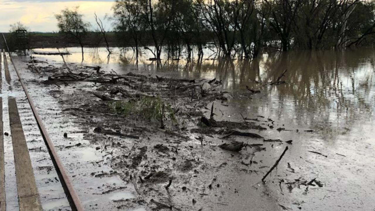 Flooding yesterday at the Grasstree Creek rail bridge.