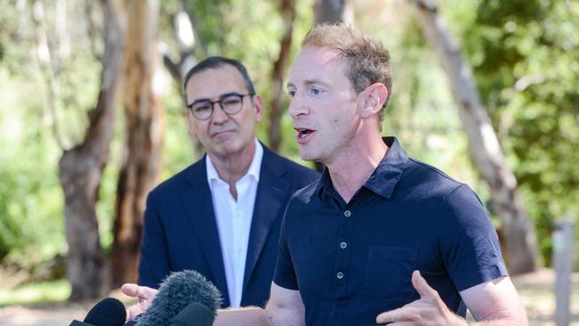 The-then premier Steven Marshall watches the-then environment and water minister David Speirs at Felixstow Reserve on February 26 where he announced funds to restore wildlife to the area. Picture: Brenton Edwards