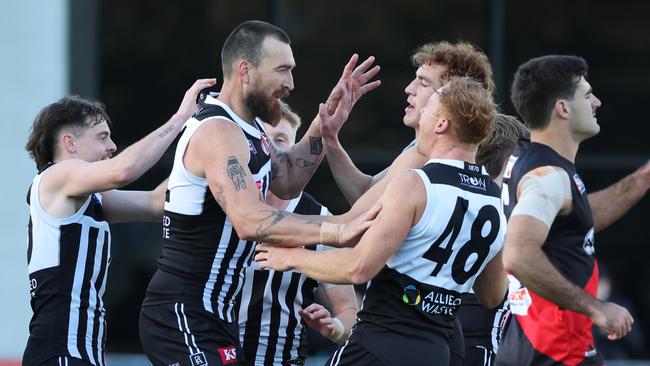 Charlie Dixon of the Magpies celebrates a goal with team mates during the Round 10 SANFL match between Port Adelaide and West Adelaide at Alberton Oval in Adelaide, Saturday, June 15, 2024. (SANFL Image/David Mariuz)