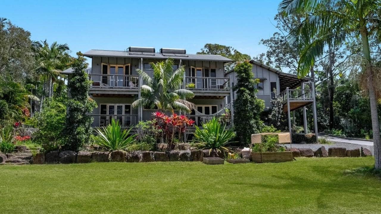 The four bedroom pavilion-style house features two wings.