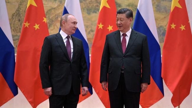 Russian President Vladimir Putin and Chinese President Xi Jinping pose during their meeting in Beijing. Picture: Alexei Druzhinin / Sputnik / AFP