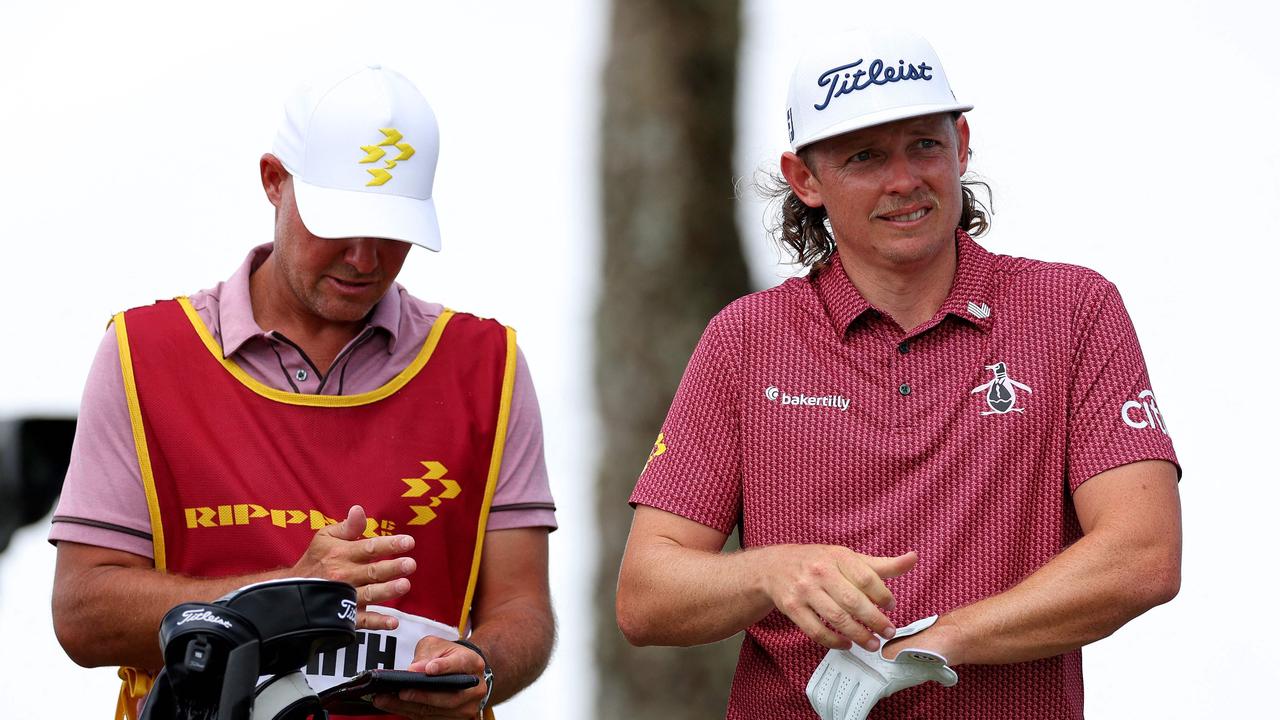 Cameron Smith and his caddie in Orlando. Mike Ehrmann/Getty Images/AFP
