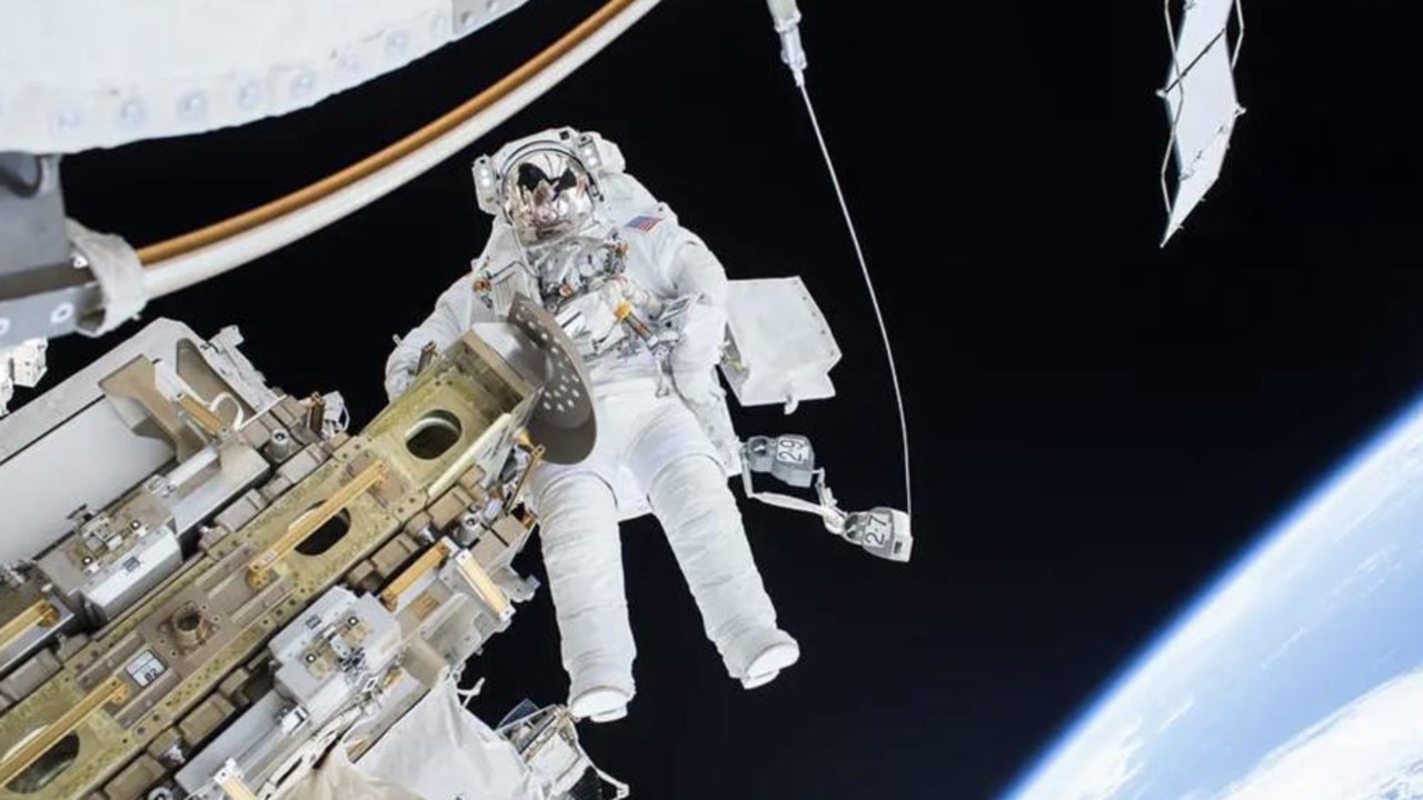 Tim Kopra completes a spacewalk during his time as an astronaut at the International Space Station. The next time astronauts return to the moon, they will grow plants. Picture: NASA