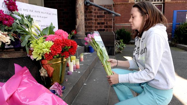 People marched down Sydney Rd, Brunswick, after Jill Meagher’s death, laying flowers on the steps of the Brunswick Baptist Church.