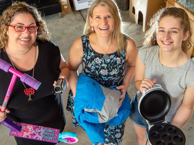 Savvy sellers are making hundreds of dollars in a day selling their trash to shoppers who think its treasure. Amy Revell, Declutter Queen, with Kelly Winder and Marisa Zantey.Picture: Jay Town