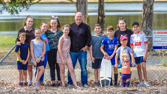 Stephen Ross and the neighbourhood kids are calling for the government to open Hope Valley Reservoir. Picture: AAP/Roy VanDerVegt