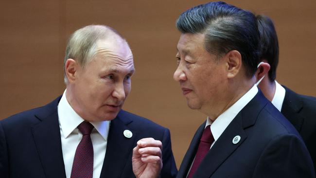 The arm wrestle with Vladimir Putin and Xi Jinping - and their spies, moles and agents of influence – is far from over. Picture: AFP