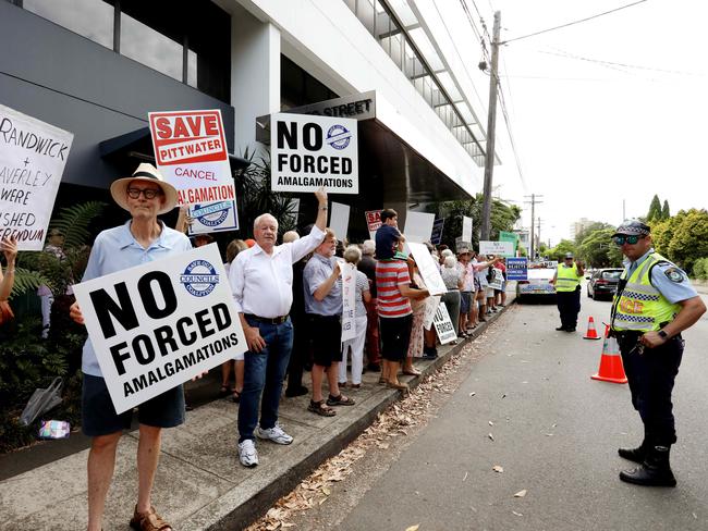 Anti-merger protesters outside former office of outgoing North Shore MP Jillian Skinner on February 5. Picture: Brianne Makin