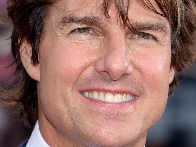 FILE - In this July 27, 2015 file photo, Tom Cruise attends the premiere of "Mission: Impossible - Rogue Nation" in Times Square in New York. A small plane assigned to the crew of a movie starring Cruise crashed in Colombia on Friday, Sept. 11, killing multiple people the country’s civilian aviation authority said. (Photo by Evan Agostini/Invision/AP, File)