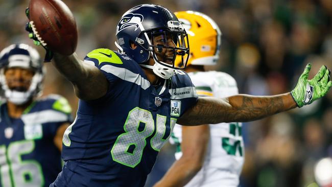 Ed Dickson celebrates the game-winning touchdown against Green Bay Packers. Otto Greule Jr/Getty Images/AFP