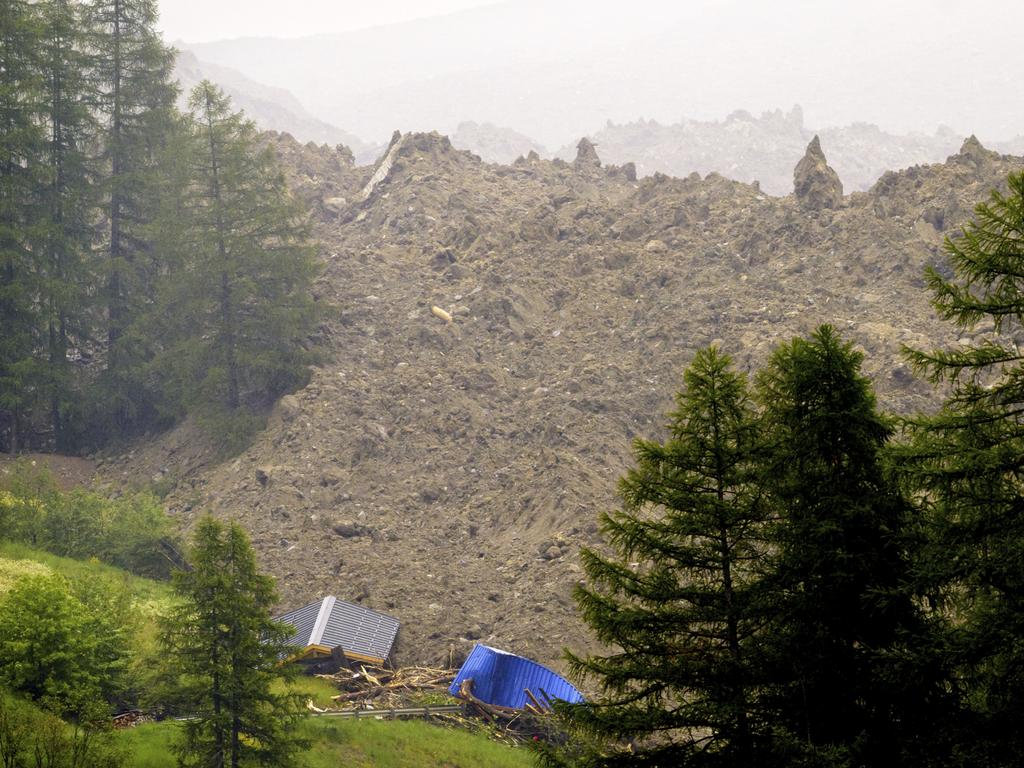 The glacier collapse had been expected for several days. Picture: Jean-Christophe Bott/Keystone via AP