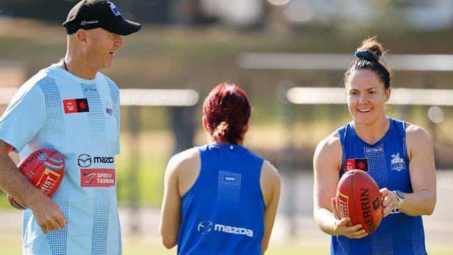 Emma Kearney (right) says the cool temperament of coach Darren Crocker (left) has helped the Roos continue their remarkable unbeaten run through 2024. Picture: Dylan Burns / Getty Images