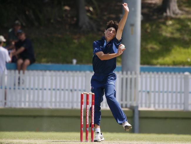 Player of the match Billy Martin unleashes during his 5-26. Picture: Warren Gannon Photography