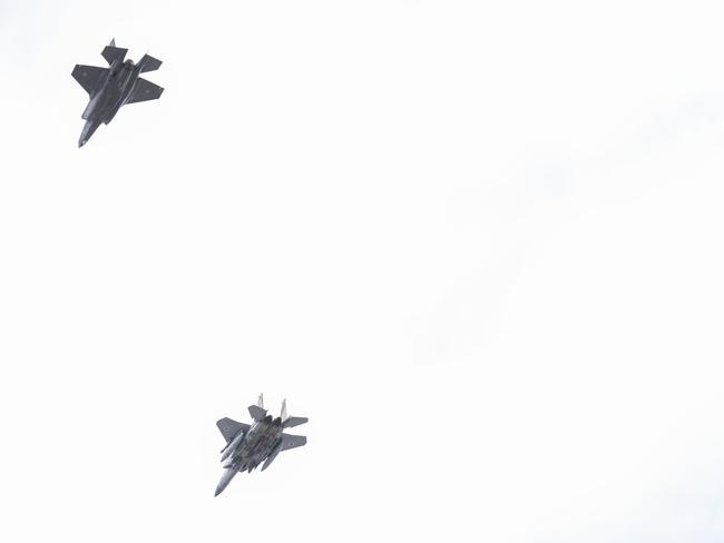 BEIRUT, LEBANON - FEBRUARY 23: Israeli fighter jets fly overhead during the funerals for former Hezbollah leaders, Hassan Nasrallah and Hashem Safieddine, at the Sports City Stadium on February 23, 2025 in Beirut, Lebanon. Tens of thousands of people have gathered in Beirut to attend the funeral of Hezbollah's former leader, Hassan Nasrallah, nearly five months after he was killed in an Israeli airstrike on a southern suburb of the Lebanese capital. Nasrallah founded and led the Shi'ite Muslim group for 30 years, through decades of conflict with Israel and became one of the most prominent Arab figures in generations. (Photo by Daniel Carde/Getty Images)