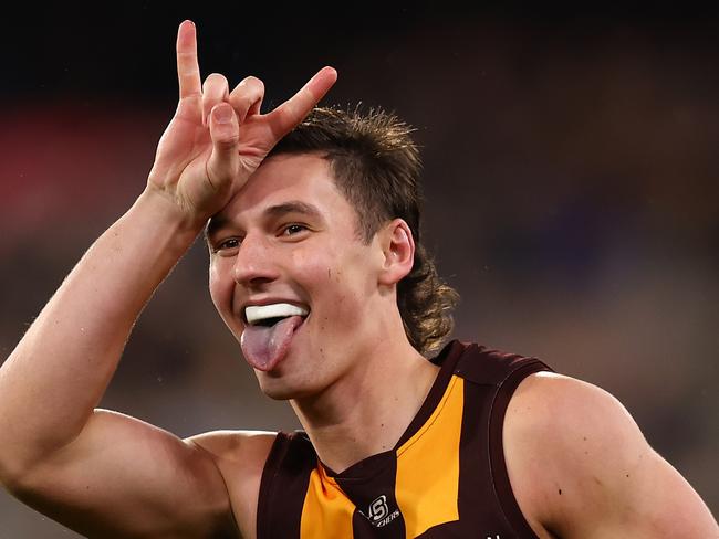 MELBOURNE, AUSTRALIA - JULY 20: Connor Macdonald of the Hawks celebrates kicking a goal during the round 19 AFL match between Hawthorn Hawks and Collingwood Magpies at Melbourne Cricket Ground on July 20, 2024 in Melbourne, Australia. (Photo by Graham Denholm/AFL Photos/via Getty Images)