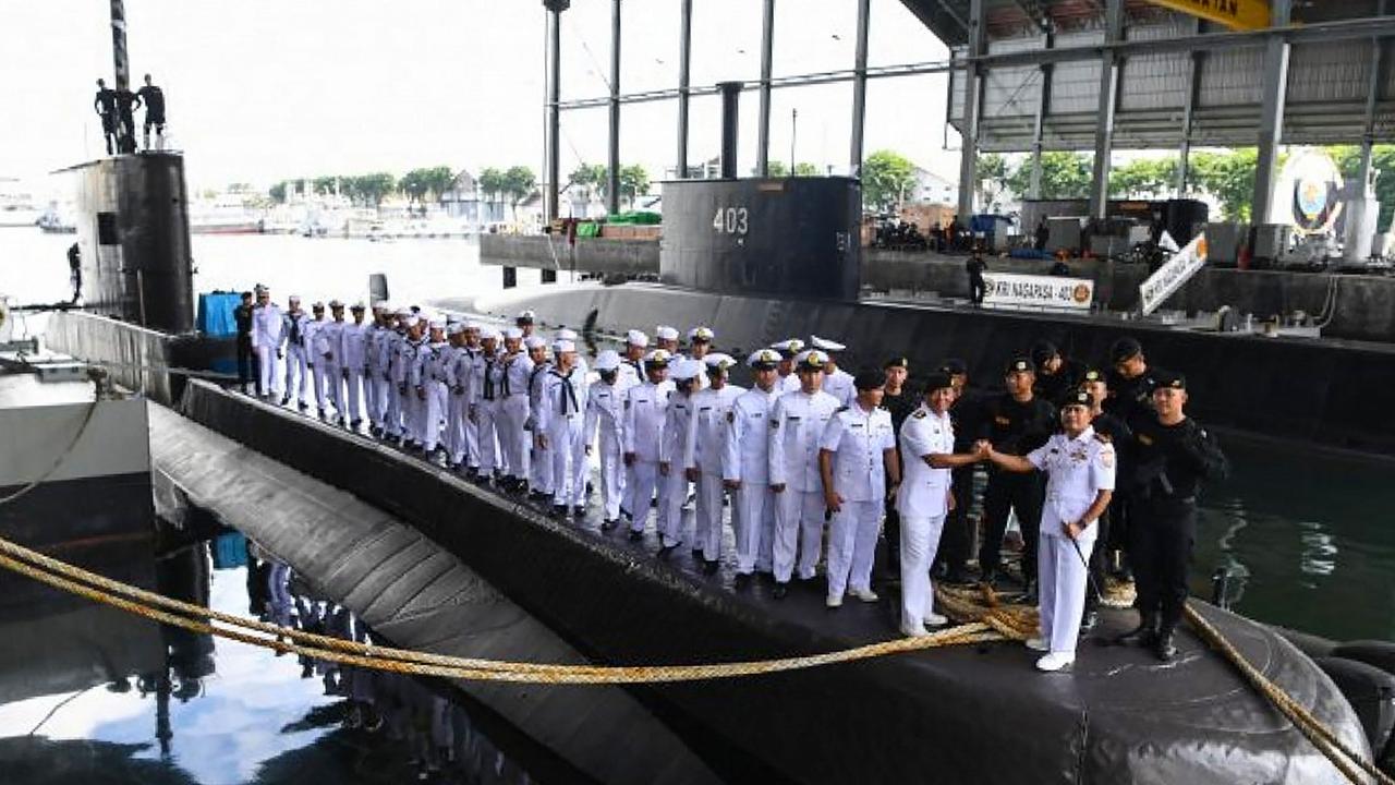 The crew and officers during a ceremony on-board the Indonesian Cakra class submarine KRI Nanggala at the naval base in Surabaya. Indonesia's military said it was searching for the submarine with 53 crew aboard after losing contact with the vessel during naval exercises. Picture: AFP