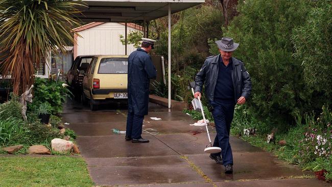 Taxi driver murder at Klemzig - police holding  metal detector at scene. sa shooting  andrew mordowicz  /Murder/SA/Mordowicz