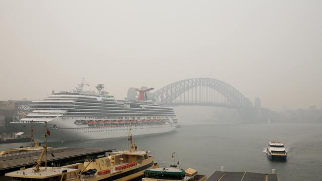 A smoke haze is again blanketing Sydney, worsening by the hour. Breathing in the haze is as bad for you health as smoking 20 cigarettes, experts say. Picture: Nikki Short