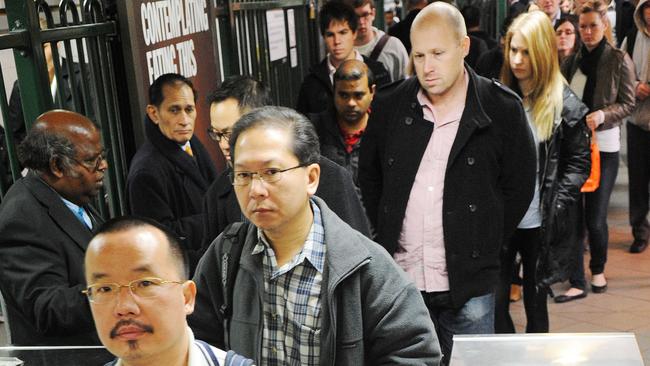 Commuters at Flinders Street railway station.