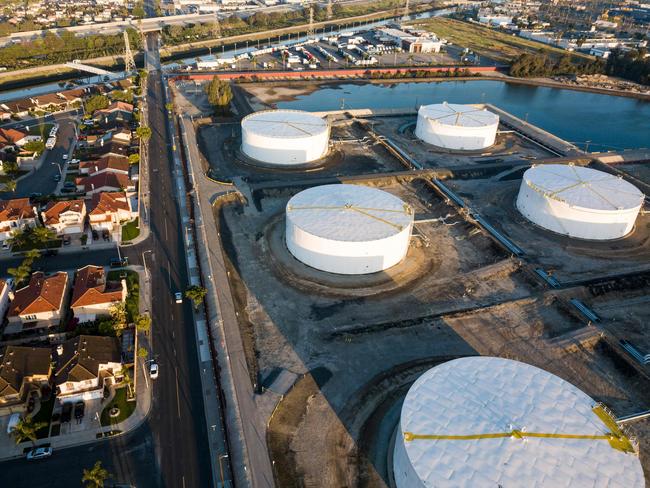 Oil-storage tanks are seen from above in Carson, California, April 25, 2020 after the price for crude plunged into negative territory for the first time in history on April 20. - Although oil prices have stabilized somewhat since the unprecedented dive, the world remains in the throes of a glut of crude oil caused by a precipitous fall in demand due to the global coronavirus pandemic coupled with a lack of storage capacity for crude already in transit or still being produced. (Photo by Robyn Beck / AFP)