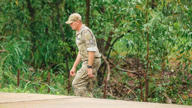 Police at the scene of the discovery of a body in a creek off Damabila Drive. Picture Glenn Campbell