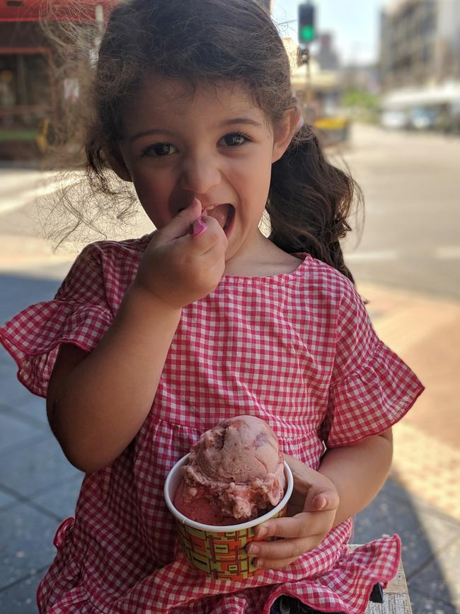 Eve, 3, taste tests Messina’s Strawberries &amp; Cream and strawberry flavours, made using strawberries from the Dural farm.