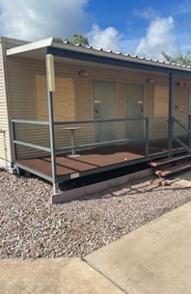 Hundreds of windows had been smashed and boarded up at the Howard Springs facility after it housed flood evacuees from Kalkarindji, Pigeon Hole and Daguragu. Picture: Supplied