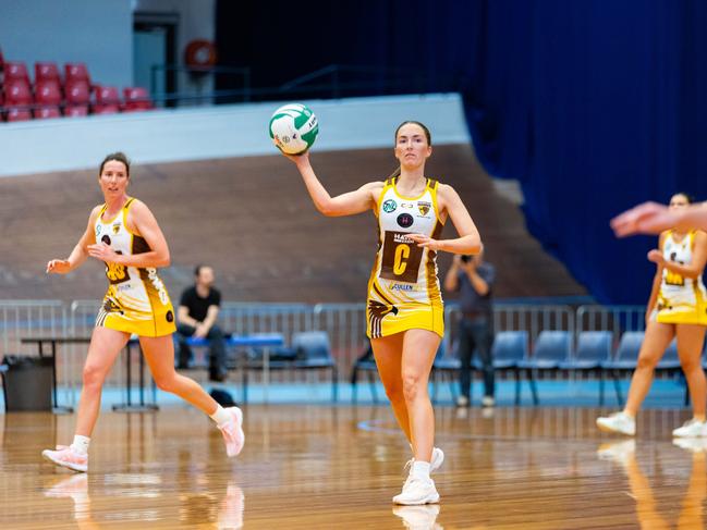 Hawks skipper Lydia Coote looks to pass during Saturday's TNL win over Cripps Waratah. Picture: Netball Tasmania/Minch Media