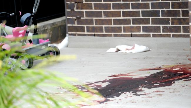 The bloody aftermath of Mejid Hamzy’s murder. He staggered away from his home and bled out on a nearby driveway. Picture: Jeremy Piper