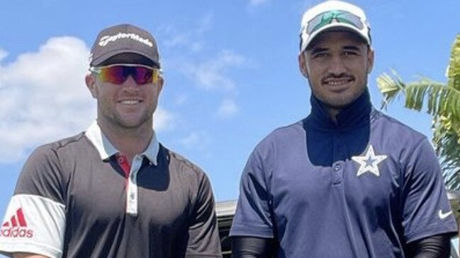 Chad Townsend and Val Holmes hit the golf course in Townsville.