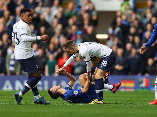 LONDON, ENGLAND - FEBRUARY 22:  Giovani Lo Celso of Spurs after clashing with Cesar Azpilicueta of Chelsea which was reviewed for a red card by VAR during the Premier League match between Chelsea FC and Tottenham Hotspur at Stamford Bridge on February 22, 2020 in London, United Kingdom. (Photo by Julian Finney/Getty Images)