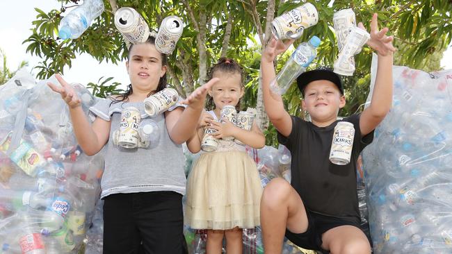 The trio have collected many bottles. Picture: Tertius Pickard.