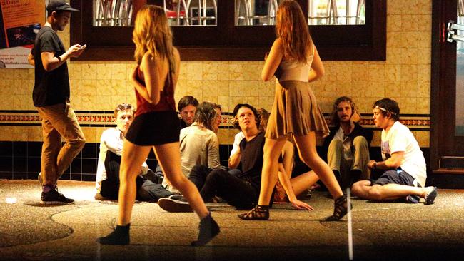 Teenagers fraternise on a weekend night during schoolies week in Byron Bay. About 76,000 teenagers receive Youth Allowance welfare.