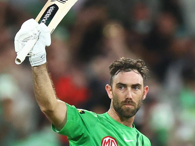 MELBOURNE, AUSTRALIA - JANUARY 19: Glenn Maxwell of the Stars raises his bat after scoring 150 runs during the Men's Big Bash League match between the Melbourne Stars and the Hobart Hurricanes at Melbourne Cricket Ground, on January 19, 2022, in Melbourne, Australia. (Photo by Mike Owen/Getty Images)