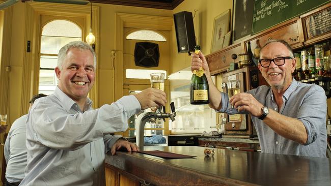Olivier Krug, left, and Exeter Hotel licensee Kevin Gregg in the front bar of the Adelaide pub.
