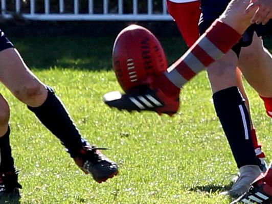 Increasing popularity of junior AFL on the North Shore. Under 11s AFL match between Mosman (red) and St Ives - generic action shots.Middle Head Oval, Mosman, NSW, Australia. 16 June 2018. (AAP Image/Annika Enderborg)