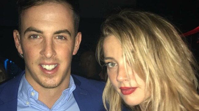 Sin City nightclub VIP host Ric Gibson with Aquaman star and Hollywood A-lister Amber Heard in 2017 - she ordered red wine and Mr Gibson had to go find some.