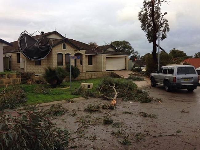 Storm damage in a Beeliar street. Picture: Jayde Quinn/Perth Weather Live