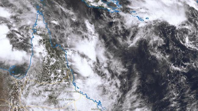 A satellite image of the tropical low sitting over North Queensland at midday on Sunday.