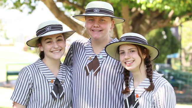 St Rita’s College Clayfield captain Caitlin Wasmund Loughnan (centre) with vice captains Elizabeth Seccombe and Gabrielle Wade.