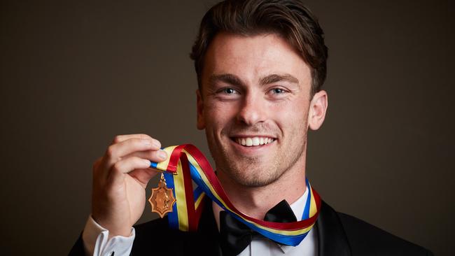 Luke Partington with his Magarey Medal. Picture: MATT LOXTON