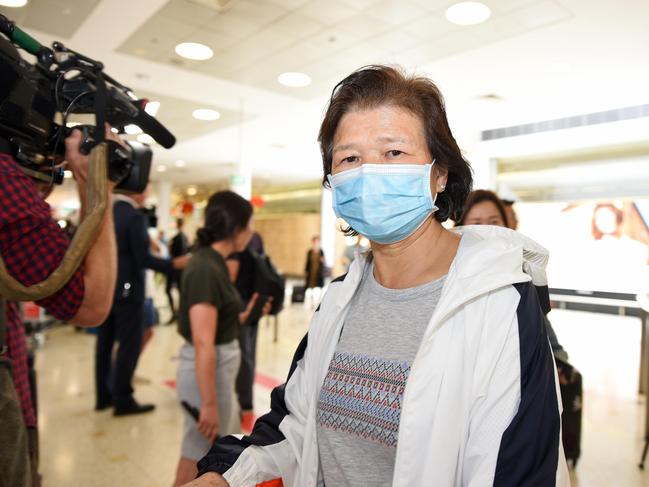 Photo of a passenger believed to be passengers from flight MU749 from Wuhan China landing into Sydney Airport. Picture: Flavio Brancaleone