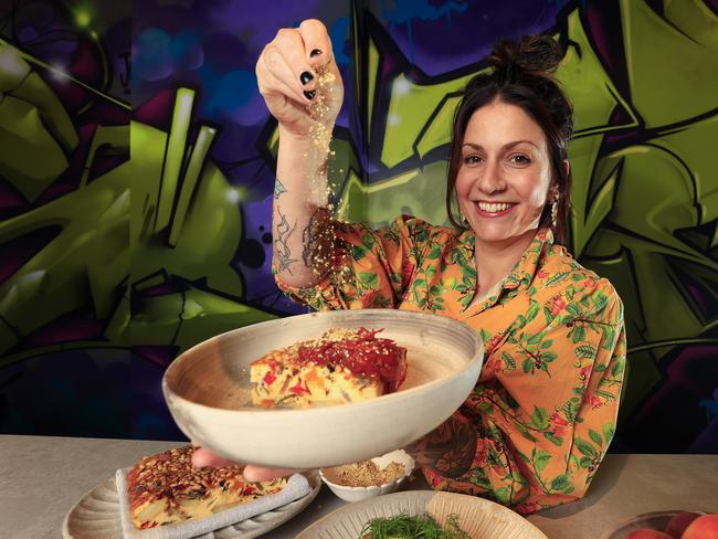 Sarah Baldwin at her restaurant, joy, with plated Boxing Day leftovers dishes. With Frittata and Scrambled Eggs. Pics Adam Head